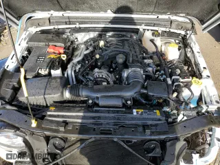 2024 Jeep Wrangler Sport with VIN 1C4PJXDG0RW326239, listed as a Copart auction lot 84757574 with 6,745 mi miles and Salvage Title. Bid and sale history available at carsss.com. Image 12.