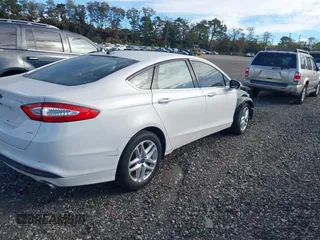 2016 Ford Fusion SE with VIN 3FA6P0H76GR235669, listed as a IAAI auction lot 40593164 with 121,973 mi miles and . Bid and sale history available at DreamBid. Image 4.