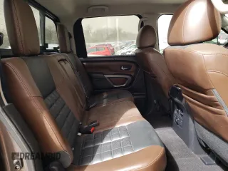 2016 Nissan Titan Pro-4X z VIN 1N6BA1F4XGN502773, wystawiony jako Copart lot #49285535 z przebiegiem 129 390 mil mil oraz Czysty tytuł • Clean title. Historia ofert i sprzedaży dostępna na DreamBid. Obrazek 10.