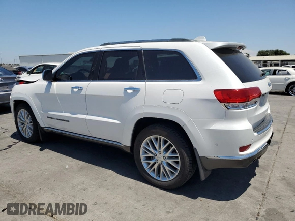 2018 Jeep Grand Cherokee Summit with VIN 1C4RJEJG9JC212554, listed as a Copart auction lot 63123065 with 82,976 mi miles and Salvage title. Bid and sale history available at DreamBid. Image 2.