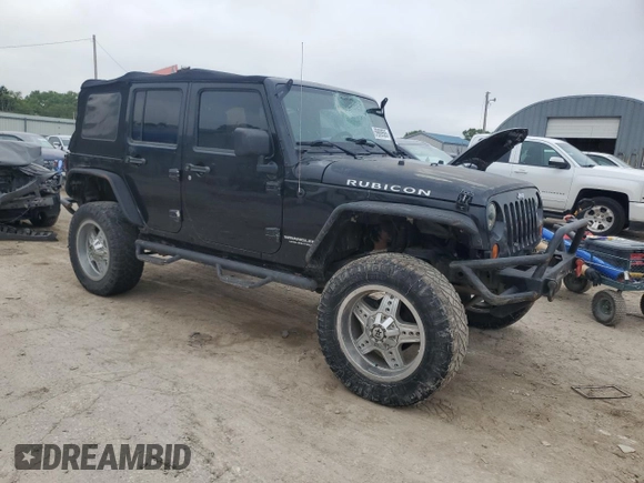 2007 Jeep Wrangler Unlimited Rubicon with VIN 1J4GA69117L112867, listed as a Copart auction lot 59909565 with 166,963 mi miles and Salvage title. Bid and sale history available at DreamBid. Image 4.