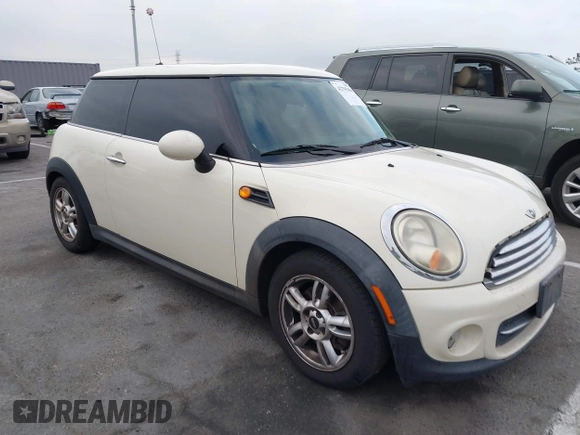 2011 MINI Hardtop with VIN WMWSU3C56BT093403, listed as a IAAI auction lot 42795188 with 123,454 mi miles and . Bid and sale history available at DreamBid. Image 1.