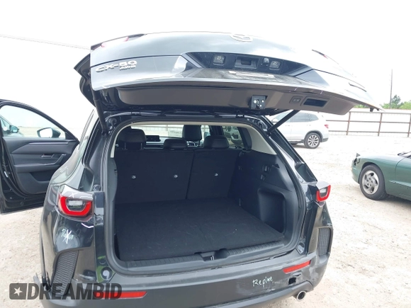 2025 Mazda CX-50 S Preferred z VIN 7MMVABBM7SN341657, wystawiony jako IAAI lot #42148357 z przebiegiem 2 861 mil mil oraz . Historia ofert i sprzedaży dostępna na DreamBid. Obrazek 17.