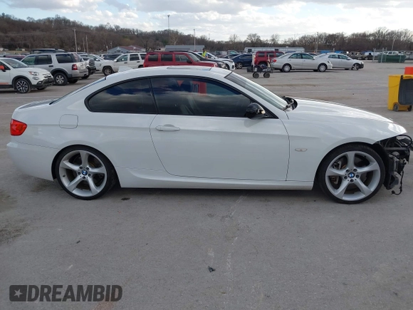 2013 BMW 3 Series 335i with VIN WBAKG7C53DJ438190, listed as a IAAI auction lot 41712275 with 126,357 mi miles. Bid and sale history available at carsss.com. Image 14.