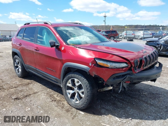 2015 Jeep Cherokee Trailhawk with VIN 1C4PJMBS0FW728361, listed as a IAAI auction lot 41978853 with 123,127 mi miles. Bid and sale history available at carsss.com. Image 1.