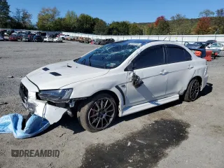 2015 Mitsubishi Lancer Evolution Final Edition z VIN JA32W7FVXFU028424, wystawiony jako Copart lot #75358704 z przebiegiem Nie podano mil oraz Szkody całkowita. Historia ofert i sprzedaży dostępna na DreamBid. Obrazek 1.