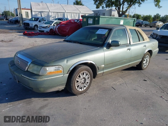 2005 Mercury Grand Marquis GS with VIN 2MEFM74WX5X627625, listed as a IAAI auction lot 41982651 with 87,044 mi miles and . Bid and sale history available at DreamBid. Image 2.