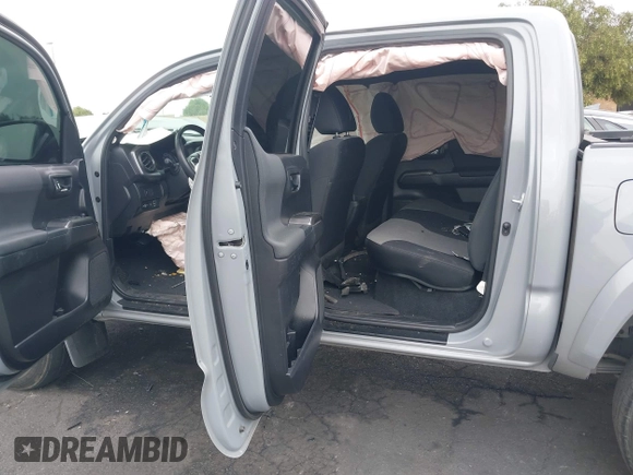 2021 Toyota Tacoma SR with VIN 3TMCZ5AN2MM405869, listed as a IAAI auction lot 42094533 with 78,449 mi miles and . Bid and sale history available at DreamBid. Image 8.