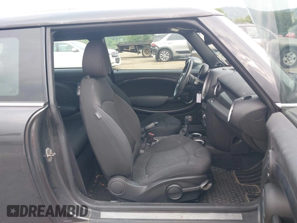 2011 MINI Hardtop S with VIN WMWSV3C58BTY13412, listed as a IAAI auction lot 42516587 with 124,831 mi miles and . Bid and sale history available at DreamBid. Image 5.