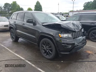 2020 Jeep Grand Cherokee Altitude with VIN 1C4RJEAG4LC439542, listed as a IAAI auction lot 42287905 with 71,427 mi miles and . Bid and sale history available at DreamBid. Image 1.
