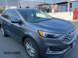 2022 Ford Edge SEL z VIN 2FMPK4J97NBA62428, wystawiony jako IAAI lot #42273195 z przebiegiem 44 241 mil mil oraz . Historia ofert i sprzedaży dostępna na DreamBid. Obrazek 1.