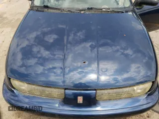 1997 Saturn SW z VIN 1G8ZK8279VZ361444, wystawiony jako Copart lot #58929684 z przebiegiem 128 554 mil mil oraz Tytuł czysty. Historia ofert i sprzedaży dostępna na DreamBid. Obrazek 11.