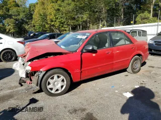 1999 Mazda Protege DX with VIN JM1BJ2223X0115069, listed as a Copart auction lot 77110674 with 107,185 mi miles and Salvage Title. Bid and sale history available at DreamBid. Image 1.