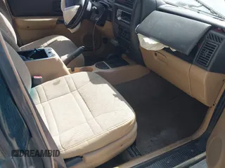 1999 Jeep Cherokee Sport with VIN 1J4FF68S7XL538831, listed as a IAAI auction lot 42101903 with 255,734 mi miles and . Bid and sale history available at DreamBid. Image 5.