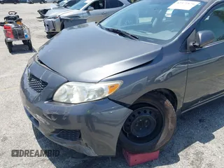 2010 Toyota Corolla with VIN 1NXBU4EE3AZ256356, listed as a IAAI auction lot 42371874 with 160,800 mi miles and . Bid and sale history available at DreamBid. Image 17.
