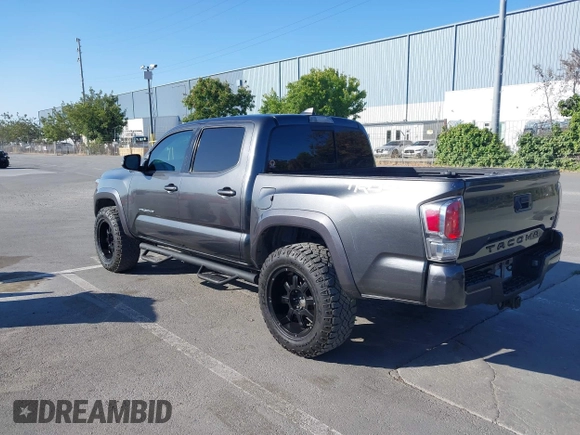 2020 Toyota Tacoma SR5 z VIN 3TMCZ5AN9LM296826, wystawiony jako IAAI lot #42533149 z przebiegiem 72 375 mil mil oraz . Historia ofert i sprzedaży dostępna na DreamBid. Obrazek 3.