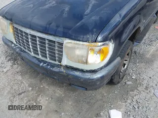 1999 Mercury Mountaineer z VIN 4M2DU52P3XUJ37055, wystawiony jako IAAI lot #41940577 z przebiegiem 218 702 mil mil oraz . Historia ofert i sprzedaży dostępna na DreamBid. Obrazek 13.