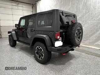 2014 Jeep Wrangler Unlimited Rubicon X with VIN 1C4HJWFG2EL312737, listed as a Copart auction lot 56547735 with 121,477 mi miles and Clean title. Bid and sale history available at DreamBid. Image 3.