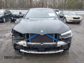 2018 BMW 5 Series M550i xDrive with VIN WBAJB9C59JB049114, listed as a IAAI auction lot 41543633 with 87,942 mi miles and . Bid and sale history available at carsss.com. Image 13.