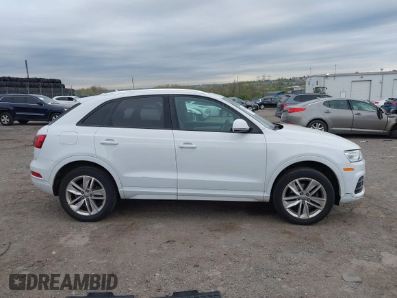 2017 Audi Q3 Premium z VIN WA1ECCFS7HR007729, wystawiony jako IAAI lot #42066580 z przebiegiem 116 460 mil mil oraz . Historia ofert i sprzedaży dostępna na DreamBid. Obrazek 13.