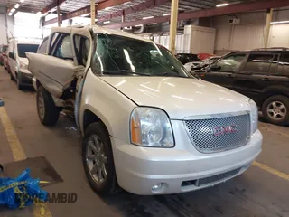 2010 GMC Yukon Denali z VIN 1GKUKEEFXAR165433, wystawiony jako IAAI lot #41744179 z przebiegiem 148 539 mil mil oraz . Historia ofert i sprzedaży dostępna na DreamBid. Obrazek 1.