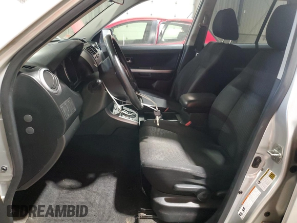 2010 Suzuki Grand Vitara Premium with VIN JS3TD0D29A4101580, listed as a Copart auction lot 56765935 with 120,791 mi miles and Clean title. Bid and sale history available at DreamBid. Image 7.