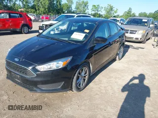 2018 Ford Focus SE with VIN 1FADP3FEXJL286396, listed as a IAAI auction lot 42634912 with 73,769 mi miles and . Bid and sale history available at DreamBid. Image 17.