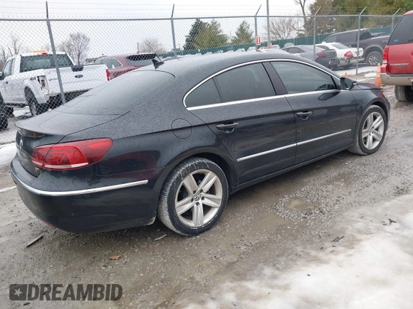 2013 Volkswagen CC Sport with VIN WVWBP7AN2DE506977, listed as a IAAI auction lot 41440929 with 62,385 mi miles. Bid and sale history available at carsss.com. Image 4.