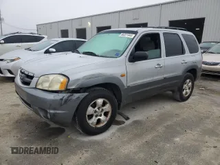 2002 Mazda Tribute LX with VIN 4F2YU08142KM62962, listed as a Copart auction lot 86321944 with 199,159 mi miles and Salvage Title. Bid and sale history available at DreamBid. Image 1.