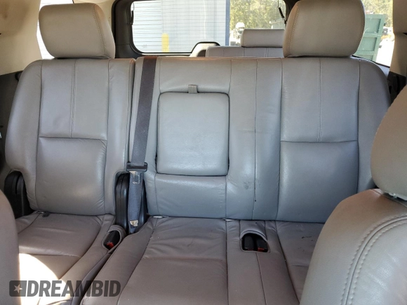 2011 GMC Yukon SLE with VIN 1GKS1AE02BR213992, listed as a Copart auction lot 75609704 with 133,536 mi miles and Salvage Title. Bid and sale history available at carsss.com. Image 10.