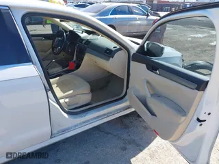 2014 Volkswagen Passat TDI SE w/Sunroof with VIN 1VWBN7A32EC016554, listed as a IAAI auction lot 41472156 with 178,149 mi miles. Bid and sale history available at carsss.com. Image 5.