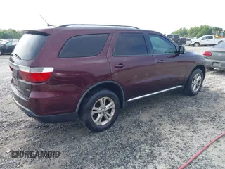 2012 Dodge Durango Crew z VIN 1C4RDHDG1CC144421, wystawiony jako IAAI lot #42232137 z przebiegiem 215 051 mil mil oraz . Historia ofert i sprzedaży dostępna na DreamBid. Obrazek 4.