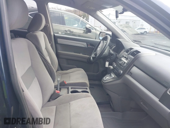 2011 Honda CR-V SE with VIN JHLRE4H41BC022777, listed as a IAAI auction lot 41990529 with 161,107 mi miles. Bid and sale history available at carsss.com. Image 5.