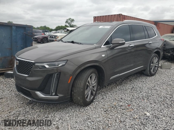 2020 Cadillac XT6 FWD Premium Luxury with VIN 1GYKPCRS4LZ133123, listed as a Copart auction lot 59411115 with 64,463 mi miles and Salvage title. Bid and sale history available at DreamBid. Image 1.