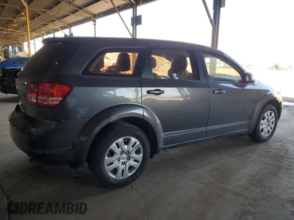 2014 Dodge Journey American Value with VIN 3C4PDCAB2ET301688, listed as a Copart auction lot 54731275 with 108,064 mi miles and Salvage Title. Bid and sale history available at DreamBid. Image 3.
