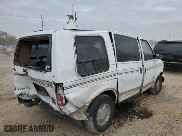 2000 GMC Safari z VIN 1GDDM19W3YB518506, wystawiony jako Copart lot #80923314 z przebiegiem 303 166 mil mil oraz Szkody całkowita. Historia ofert i sprzedaży dostępna na DreamBid. Obrazek 3.