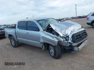 2022 Toyota Tacoma SR with VIN 3TYAX5GN8NT060017, listed as a IAAI auction lot 41504710 with 55,317 mi miles and . Bid and sale history available at DreamBid. Image 12.