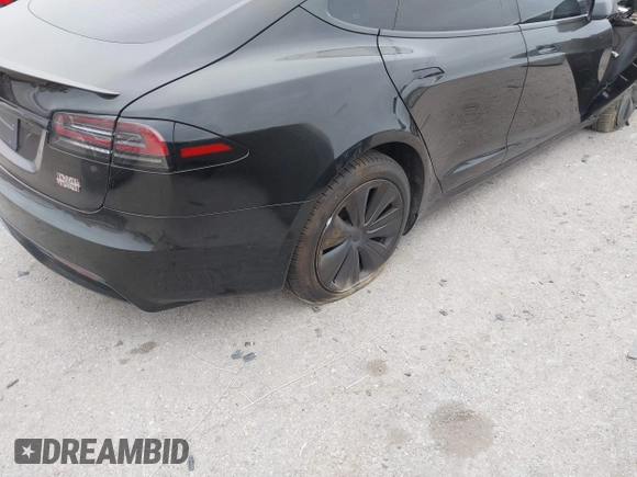 2022 Tesla Model S Plaid with VIN 5YJSA1E65NF484149, listed as a IAAI auction lot 40937538 with 11,459 mi miles and . Bid and sale history available at DreamBid. Image 18.