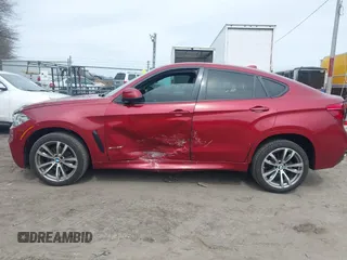 2016 BMW X6 sDrive35i with VIN 5UXKU0C52G0F93330, listed as a IAAI auction lot 41899939 with 126,404 mi miles. Bid and sale history available at carsss.com. Image 14.