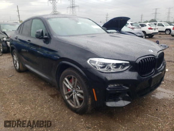 2021 BMW X4 M40i with VIN 5UX2V5C00M9H95699, listed as a Copart auction lot 63564433 with 33,500 mi miles and Salvage title. Bid and sale history available at DreamBid. Image 4.