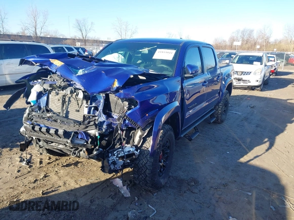 2023 Toyota Tacoma 4WD SR with VIN 3TMCZ5AN9PM559919, listed as a IAAI auction lot 41855044 with 46,153 mi miles. Bid and sale history available at carsss.com. Image 2.