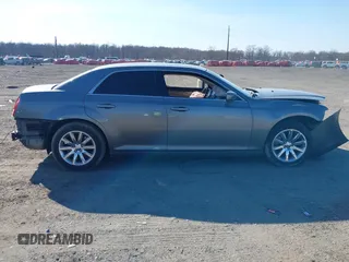 2012 Chrysler 300 with VIN 2C3CCAAG1CH138303, listed as a IAAI auction lot 41773979 with 252,550 mi miles and . Bid and sale history available at DreamBid. Image 13.