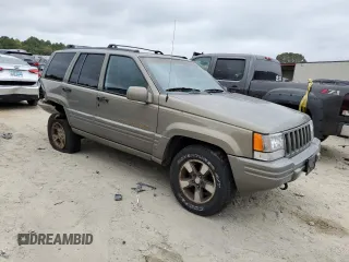 1997 Jeep Grand Cherokee Limited with VIN 1J4GZ78Y0VC599554, listed as a Copart auction lot 72006854 with 321,283 mi miles and Salvage Title. Bid and sale history available at carsss.com. Image 4.