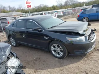 2013 Ford Taurus SEL with VIN 1FAHP2E84DG188503, listed as a IAAI auction lot 41800277 with 215,015 mi miles. Bid and sale history available at carsss.com. Image 13.