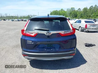 2019 Honda CR-V LX with VIN 2HKRW5H39KH400453, listed as a IAAI auction lot 40041024 with 76,932 mi miles and . Bid and sale history available at carsss.com. Image 17.