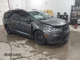 2021 Chrysler Pacifica Hybrid Limited with VIN 2C4RC1S77MR517581, listed as a IAAI auction lot 42390291 with 64,098 mi miles and . Bid and sale history available at DreamBid. Image 1.