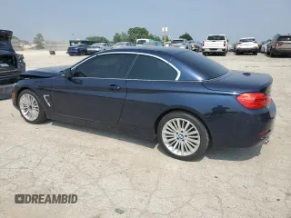 2015 BMW 4 Series 428i xDrive with VIN WBA3T1C55FP820640, listed as a Copart auction lot 60394605 with 111,288 mi miles and Salvage title. Bid and sale history available at DreamBid. Image 2.