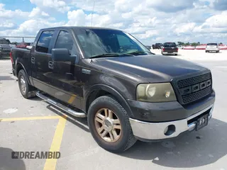 2006 Ford F-150 XLT with VIN 1FTPW12536KB75576, listed as a IAAI auction lot 42136498 with 165,337 mi miles. Bid and sale history available at carsss.com. Image 1.