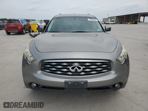 2009 Infiniti FX z VIN JNRAS18U39M103785, wystawiony jako Copart lot #52909935 z przebiegiem 168 336 mil mil oraz Czysty tytuł • Clean title. Historia ofert i sprzedaży dostępna na DreamBid. Obrazek 5.