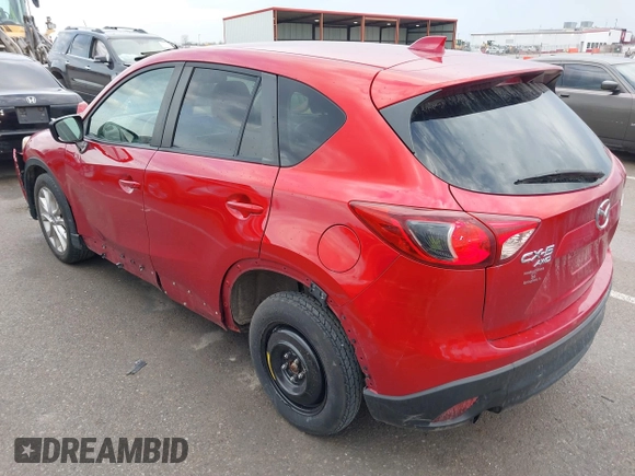 2015 Mazda CX-5 Grand Touring with VIN JM3KE4DY1F0540586, listed as a IAAI auction lot 41710216 with 148,800 mi miles. Bid and sale history available at carsss.com. Image 3.
